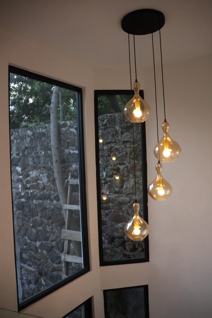 Cascading chandelier in the Casa Luna stairwell