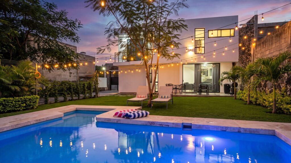 Casa Luna's private pool and terrace at dusk in Cuernavaca, Mexico